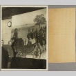 Men looking at a large photo of a carriage processional (ddr-njpa-13-1559)