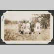 five women and a child posed in a field (ddr-densho-378-566)
