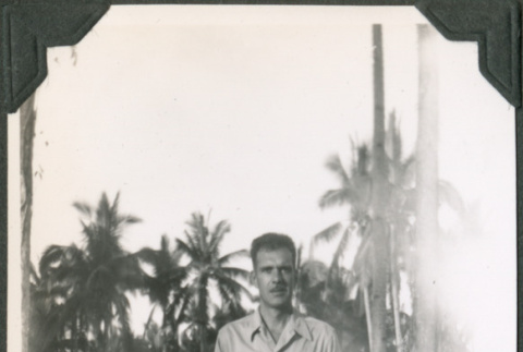 Man standing by trees (ddr-ajah-2-661)