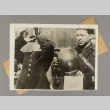 A soldier holding a balloon[?] next to another soldier looking through binoculars (ddr-njpa-13-1314)