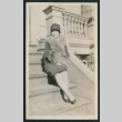 woman seated on stairs (ddr-densho-378-356)
