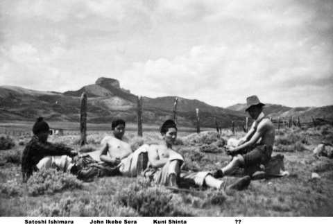 Four boys resting on hike to Heart Mountain (ddr-ajah-2-896)