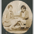 Two women sitting on steps (ddr-densho-316-381)