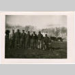 Seven men standing in field with cows (ddr-densho-329-1365)