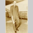 A man walking on the deck of a ship (ddr-njpa-1-1906)
