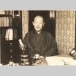 A man at his desk (ddr-njpa-4-2211)