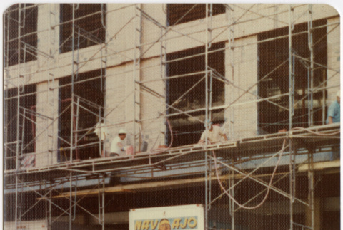 Building with scaffolding (ddr-densho-424-858)
