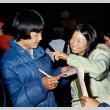 Ken Sasaki and Lynn Hikido participating in icebreakers (ddr-densho-336-728)