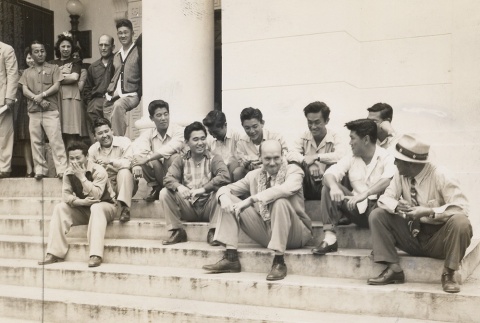 Earl Finch sitting with a group on the steps of a building (ddr-njpa-1-306)
