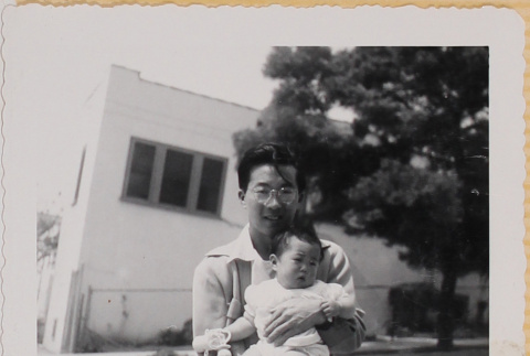 Hardy Shiomi holding Susan Shiomi (ddr-densho-522-148)