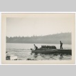 Two men on boat and pier (ddr-densho-332-13)