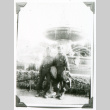 William Kochiyama and one other in front of fountain (ddr-densho-1007-822)