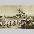 Sailors at a dock waiting to board the Karlsruhe (ddr-njpa-13-949)