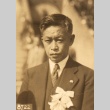 Man with ribbons pinned to his chest (ddr-njpa-4-2470)