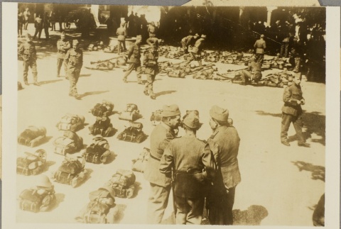 Swiss soldiers preparing field packs (ddr-njpa-13-1095)