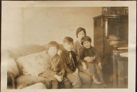 Japanese American family at home (ddr-densho-259-102)