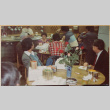 Groups of people seated at two tables (ddr-densho-426-1288)