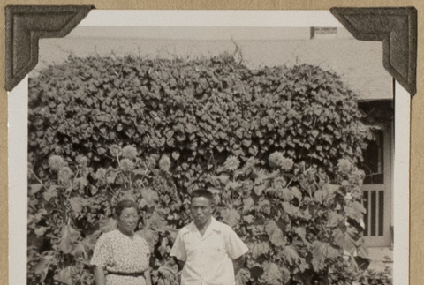 Mr. and Mrs. Kikawa in front of their Rohwer home (ddr-densho-542-409)
