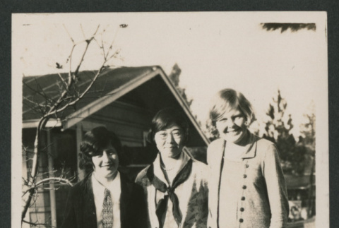 3 women and a Santa outside (ddr-densho-378-835)