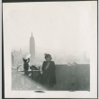A woman on the roof deck of Rockefeller Center (ddr-densho-298-219)