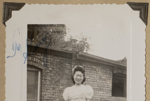 Betty Miyaguchi in a puff sleeve dress (ddr-densho-542-396)