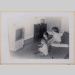 David, Peter, and Mary Alice  watching TV (ddr-densho-462-271)