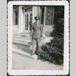 Man standing on steps of building (ddr-densho-434-471)