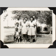 Portrait of family standing on lawn (ddr-densho-587-28)