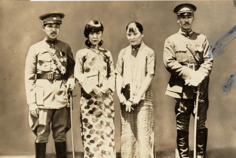 Zhang Xueliang in military dress posing with two women and a man (ddr-njpa-1-125)
