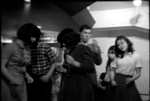 Group of young people dancing (ddr-densho-426-2373)