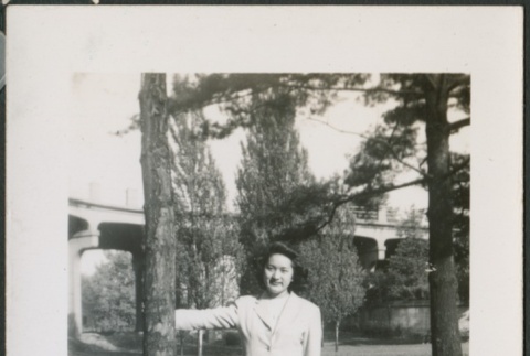 A young woman at a park (ddr-densho-298-142)
