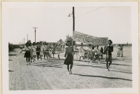 Group marches in Armistice Day parade (ddr-densho-37-1173)