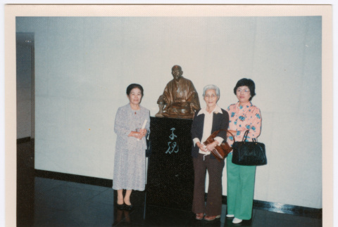 Mitsuye Yabe and Friends with Statue (ddr-ohs-1-222)