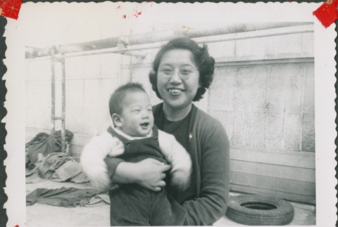 Woman holding a baby (ddr-densho-321-1098)