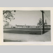 View of a building with an ambulance (ddr-densho-37-1032)
