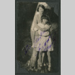 two girls hugging (ddr-densho-378-521)