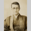 Ernest Shinkaku Hunt posing in vestments (ddr-njpa-2-445)