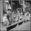 Children outside barracks (ddr-densho-37-612)