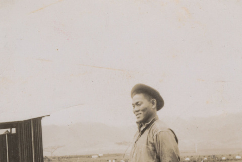 Man stands sideways (ddr-janm-17-37)
