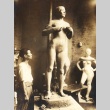Sculptor working on a statue (ddr-njpa-4-2697)