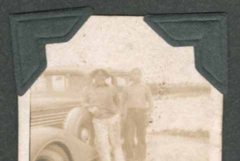 Two boys next to car (ddr-densho-550-222)