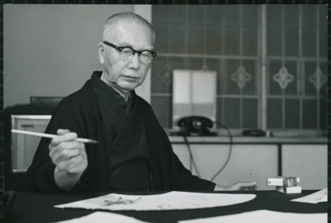 Man practicing calligraphy (ddr-densho-359-1204)