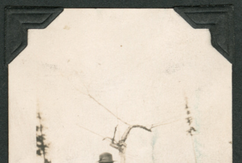 Photo of a family of three (ddr-densho-483-258)