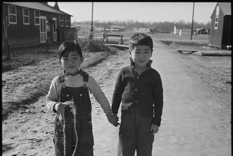 Children walking in an concentration camp (ddr-densho-37-802)