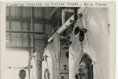 Plumbing repairs in boiler house (ddr-densho-37-2159)