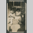 two kids sitting on crate (ddr-densho-378-480)