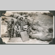 Group of men sitting of logs with sign: Co. A. 53rd (ddr-ajah-2-194)