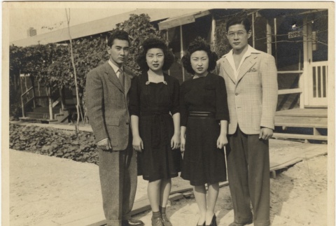 A group standing in front of barracks (ddr-densho-331-4)