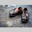 Muddy shoes on a beach (ddr-densho-336-389)