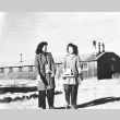 Japanese Americans carrying ice skates (ddr-densho-39-40)